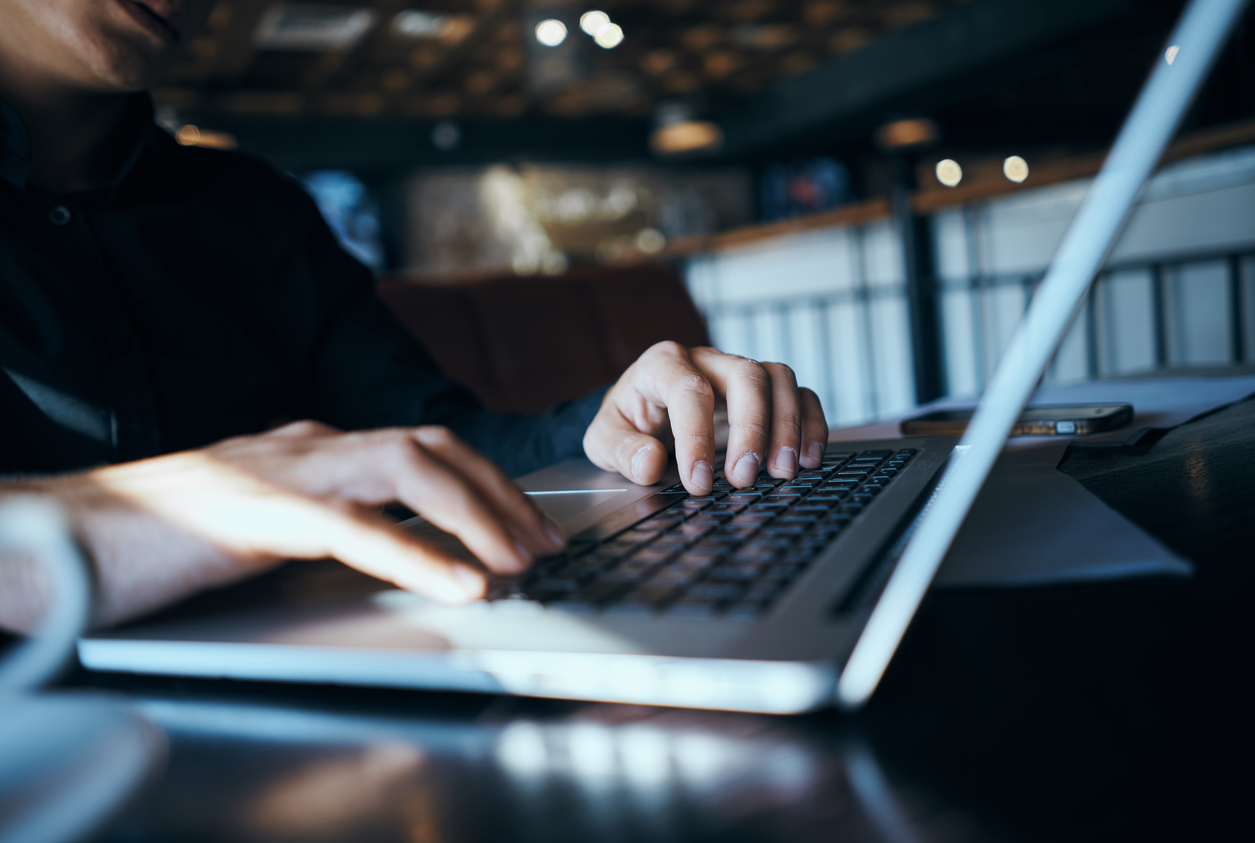 man-typing-on-a-computer-free-image